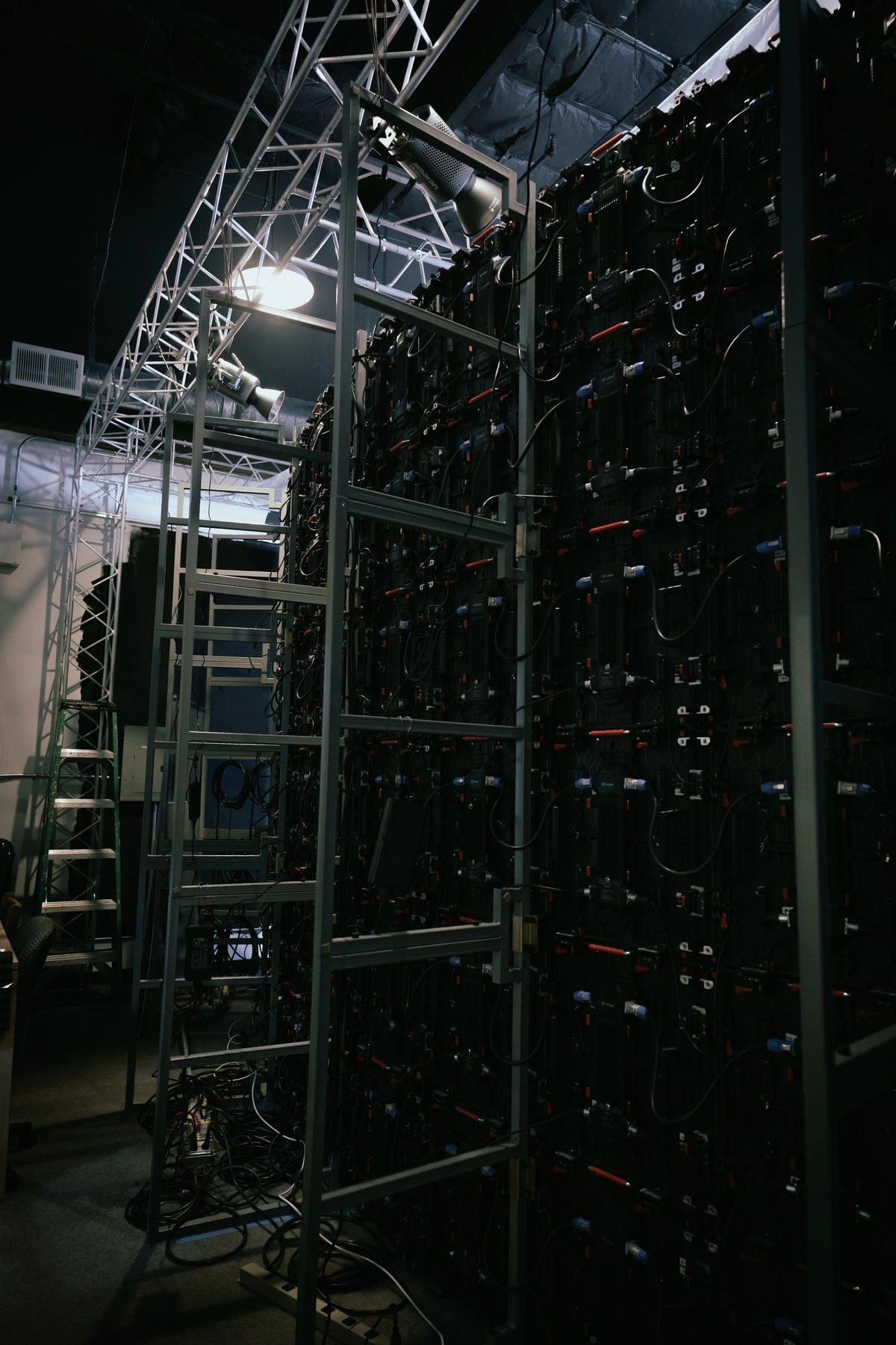 The structural frame and cabling behind the LED panels